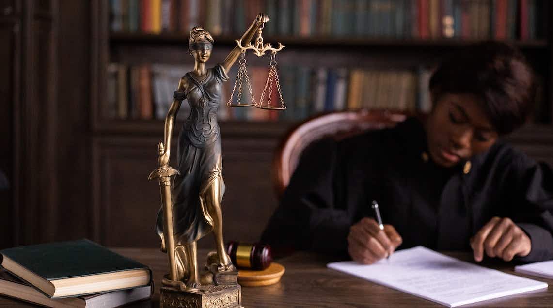 Lady justice and judge representing criminal law